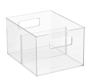 A large clear plastic pantry bin with handles and an interior divider, shown against a white background.